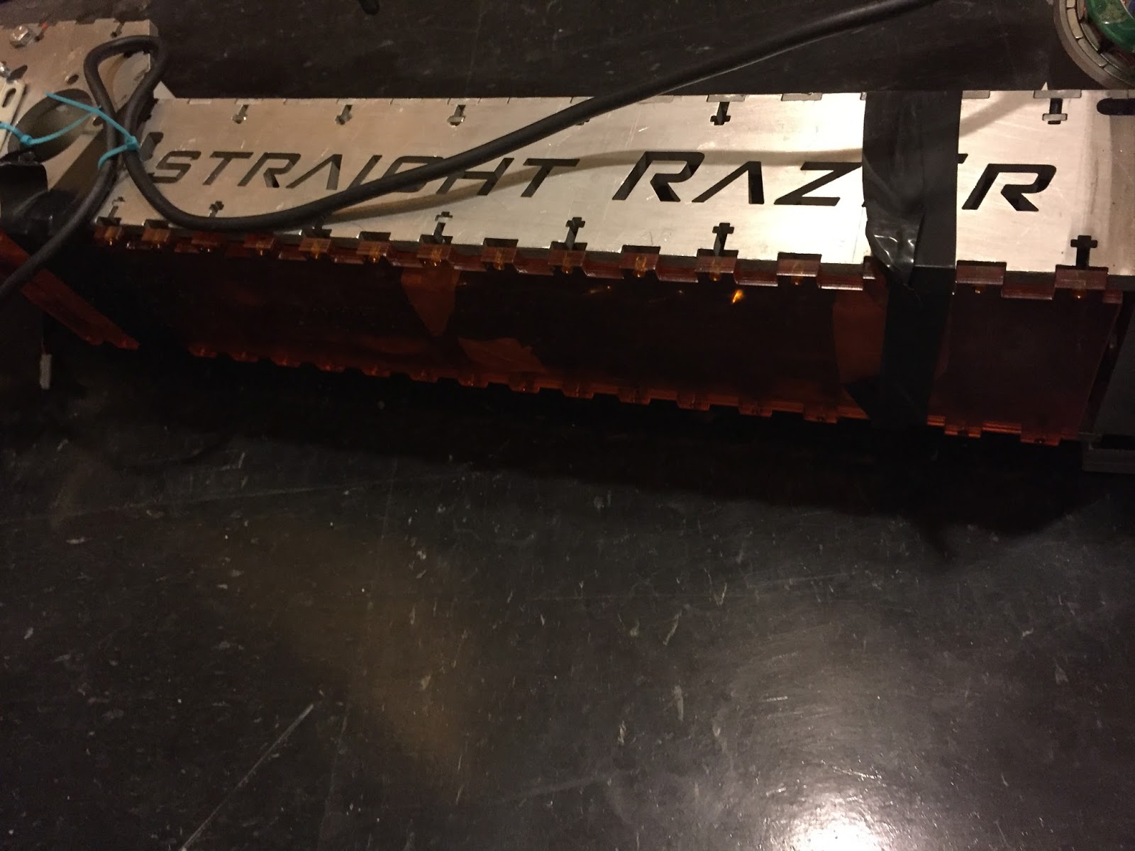 A laser cut acrylic panel for the bottom