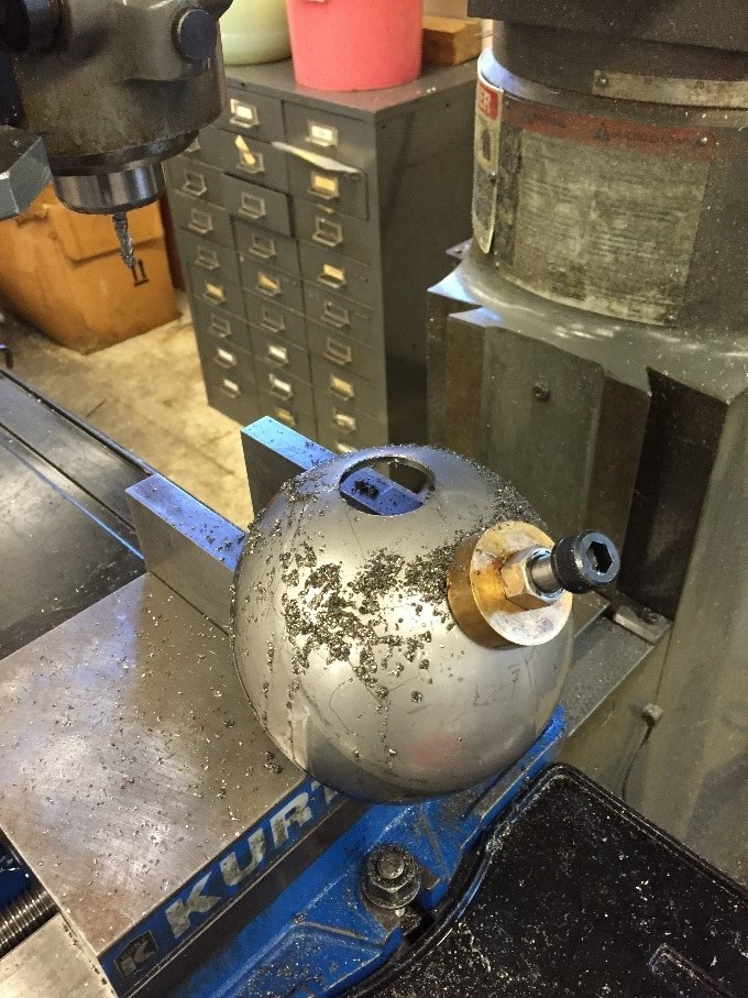 Sphere with two completed holes